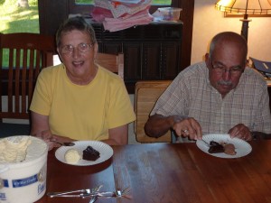 mom and dad eating cake