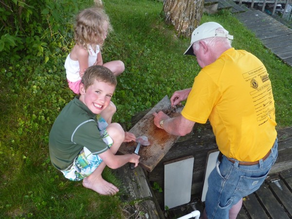edluke fileting Edward Luke working the filet knife with Grandpa.